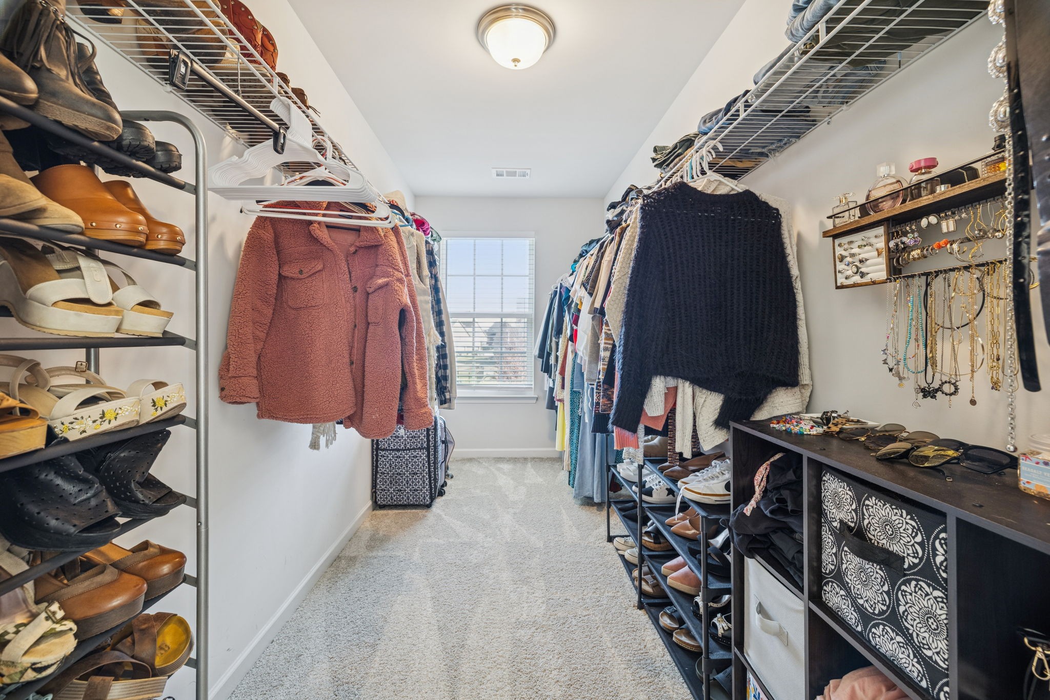 140 Hackney Lane Gallatin, TN 37066 - Photo 53 of 66 a view of walk in closet with clothes and shoes