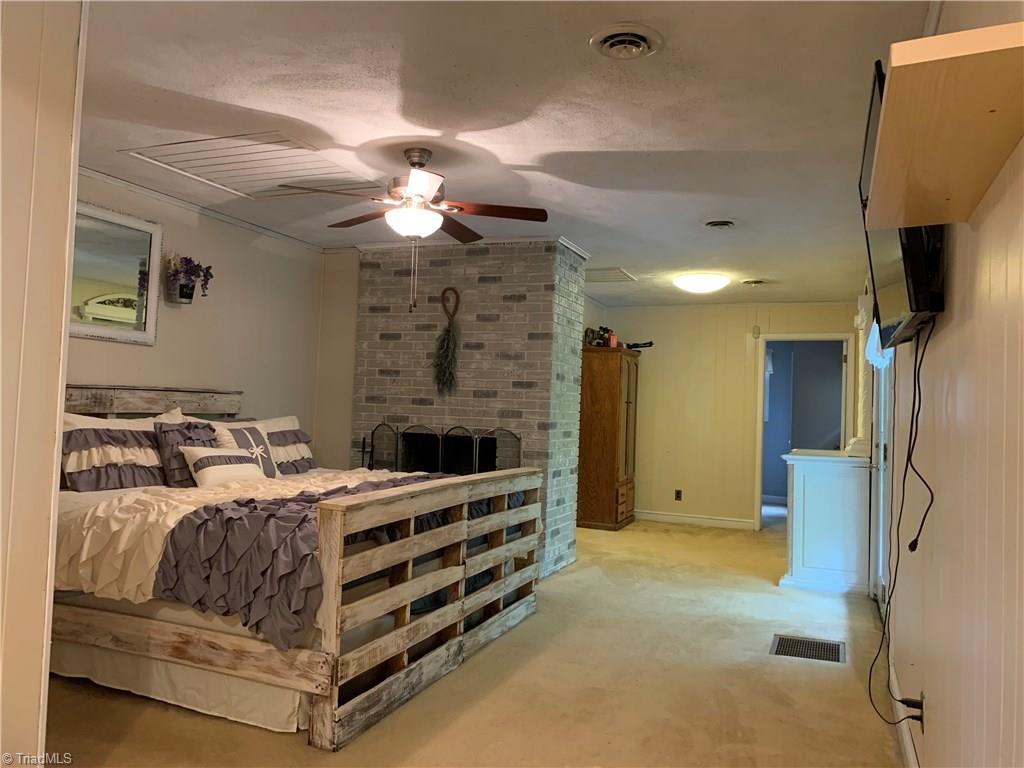 310 Paso Street Rural Hall, NC 27045 - Photo 14 of 30 upper level loft with FP could be master bedroom or family room, 2-closets & full bath