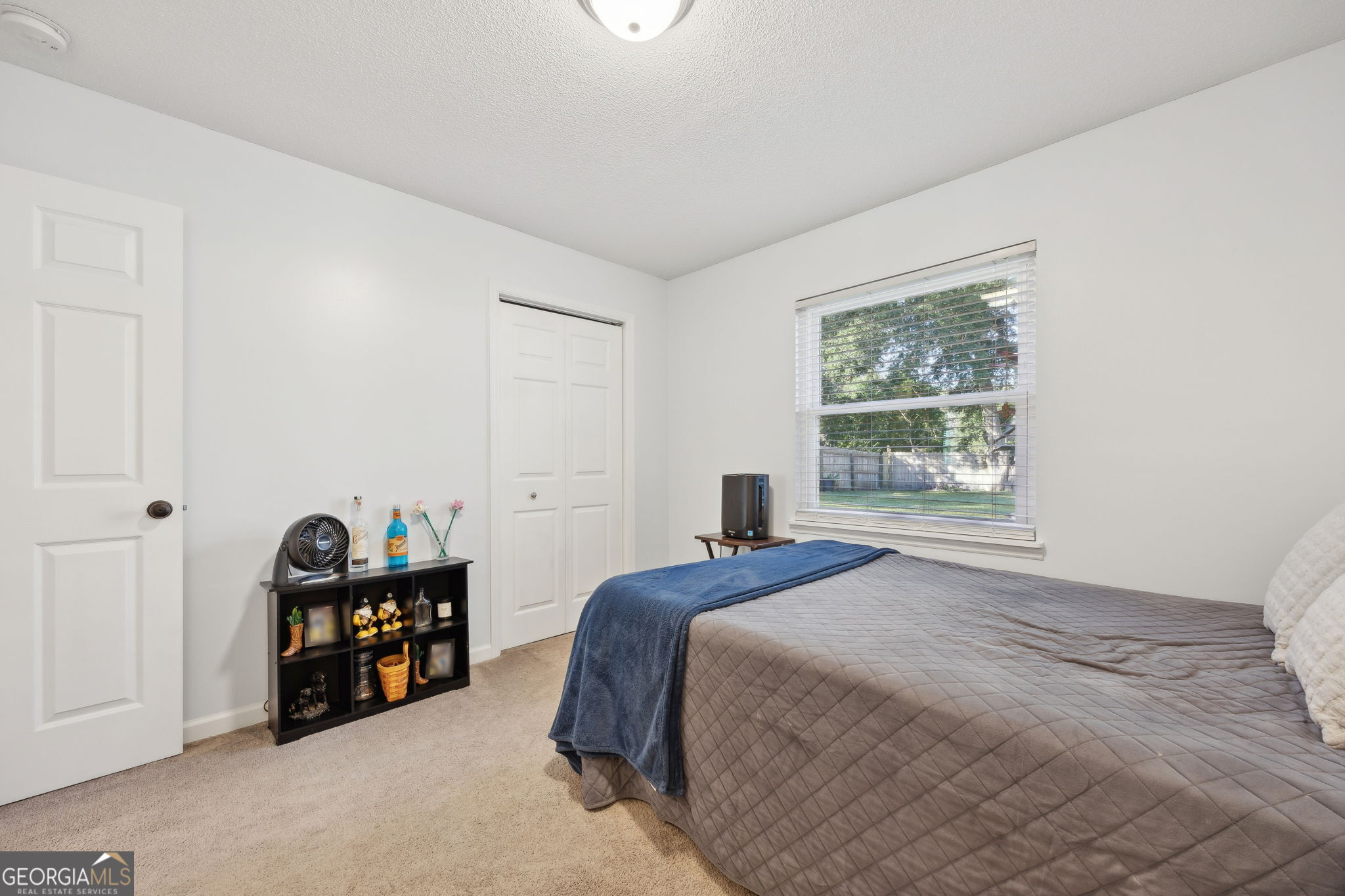 381 Powderhorn Road St. Marys, GA 31558 - Photo 25 of 37 a bedroom with a bed and a window