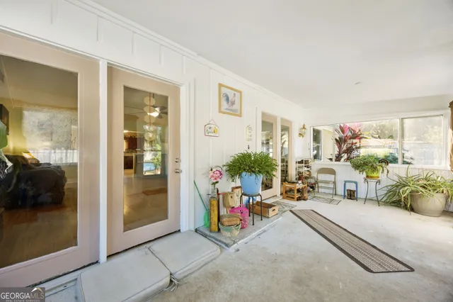 a view of a livingroom with furniture and a livingroom