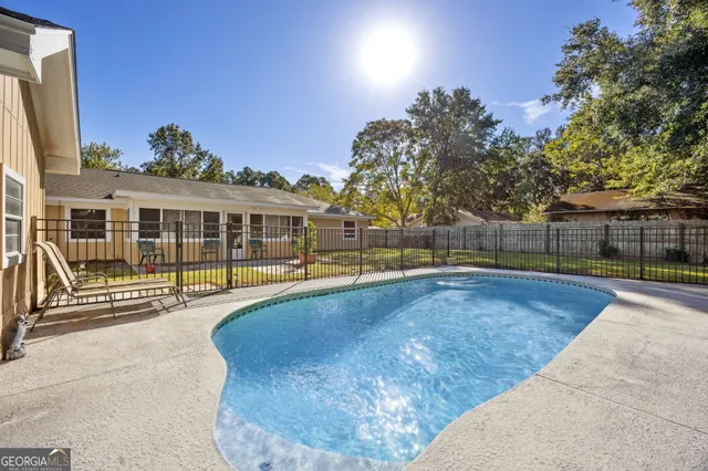 a view of a house with a swimming pool