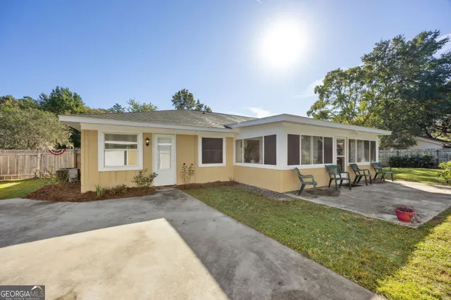 front view of a house with a patio
