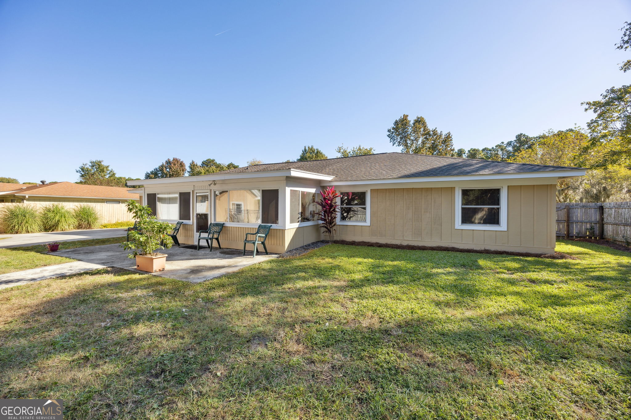 381 Powderhorn Road St. Marys, GA 31558 - Photo 33 of 37 a view of a house with a backyard porch and sitting area