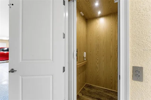 a kitchen with granite countertop cabinets stainless steel appliances and a counter space