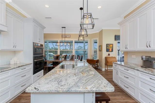 a white bath tub sitting next to a white toilet