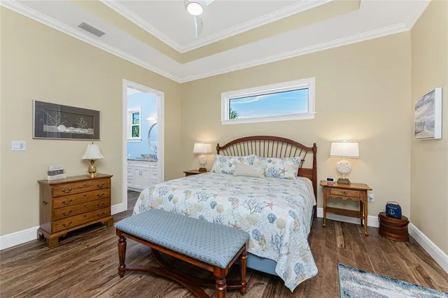 a view of a balcony with furniture and wooden floor