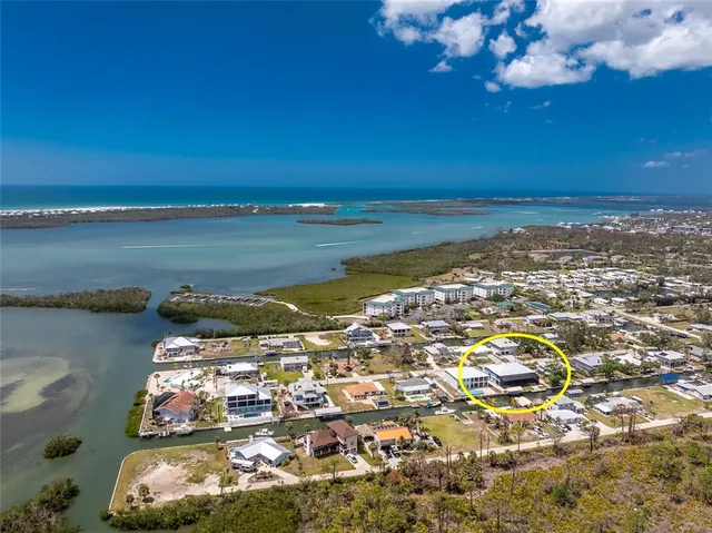 a room that has a dresser and chair in it