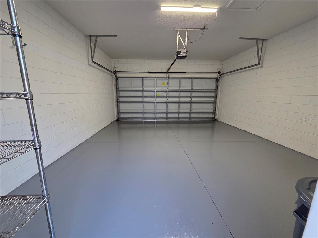 14239 Avenue Of The Groves Winter Garden, FL 34787 - Photo 24 of 54 a view of a room with racks on the wall