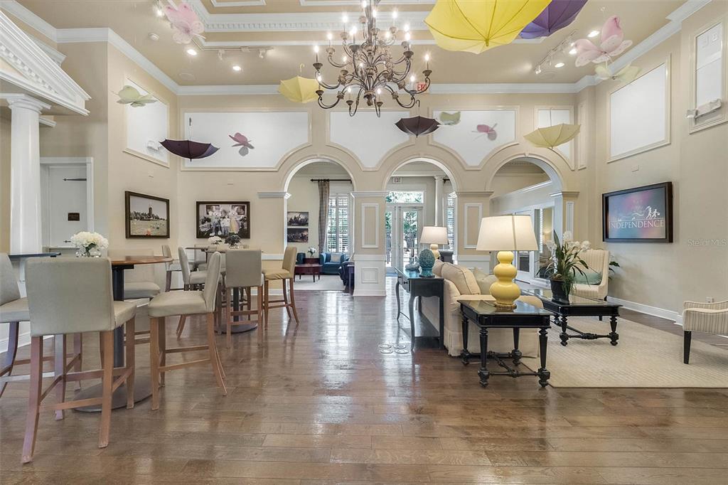 14239 Avenue Of The Groves Winter Garden, FL 34787 - Photo 32 of 54 a view of a living room and dining room