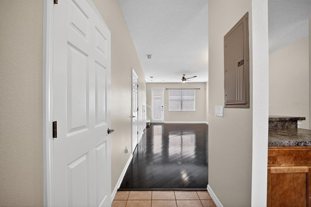 14239 Avenue Of The Groves Winter Garden, FL 34787 - Photo 10 of 54 a view of a hallway with white doors