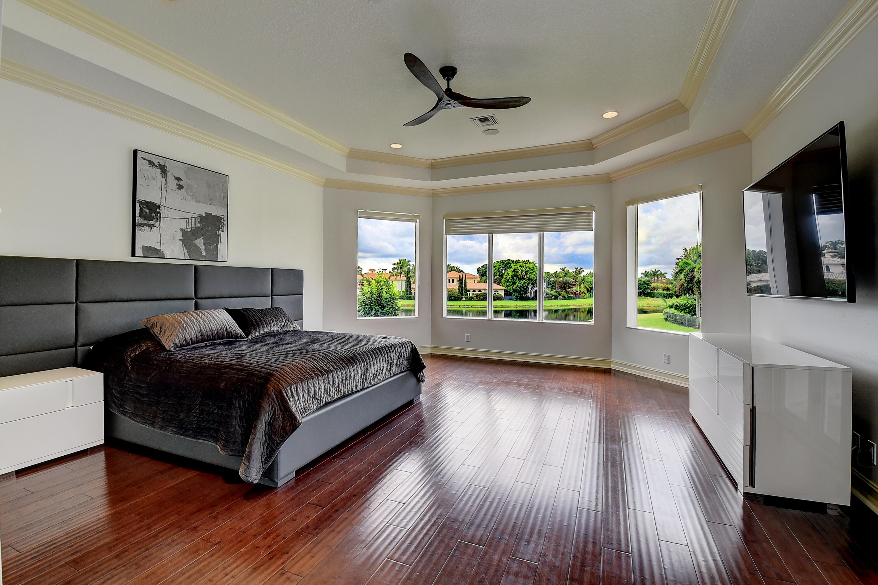 17698 Middlebrook Way Boca Raton, FL 33496 - Photo 27 of 68 a living room with a bed furniture and a large window
