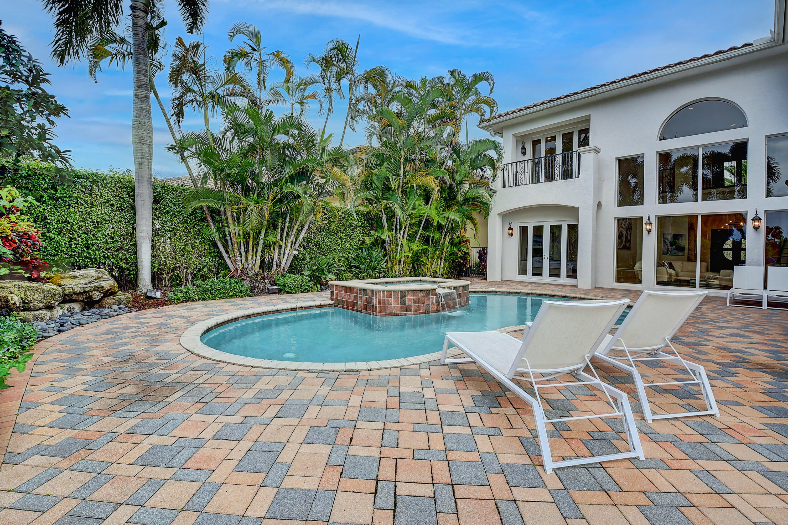 17698 Middlebrook Way Boca Raton, FL 33496 - Photo 45 of 68 a view of a swimming pool with a patio