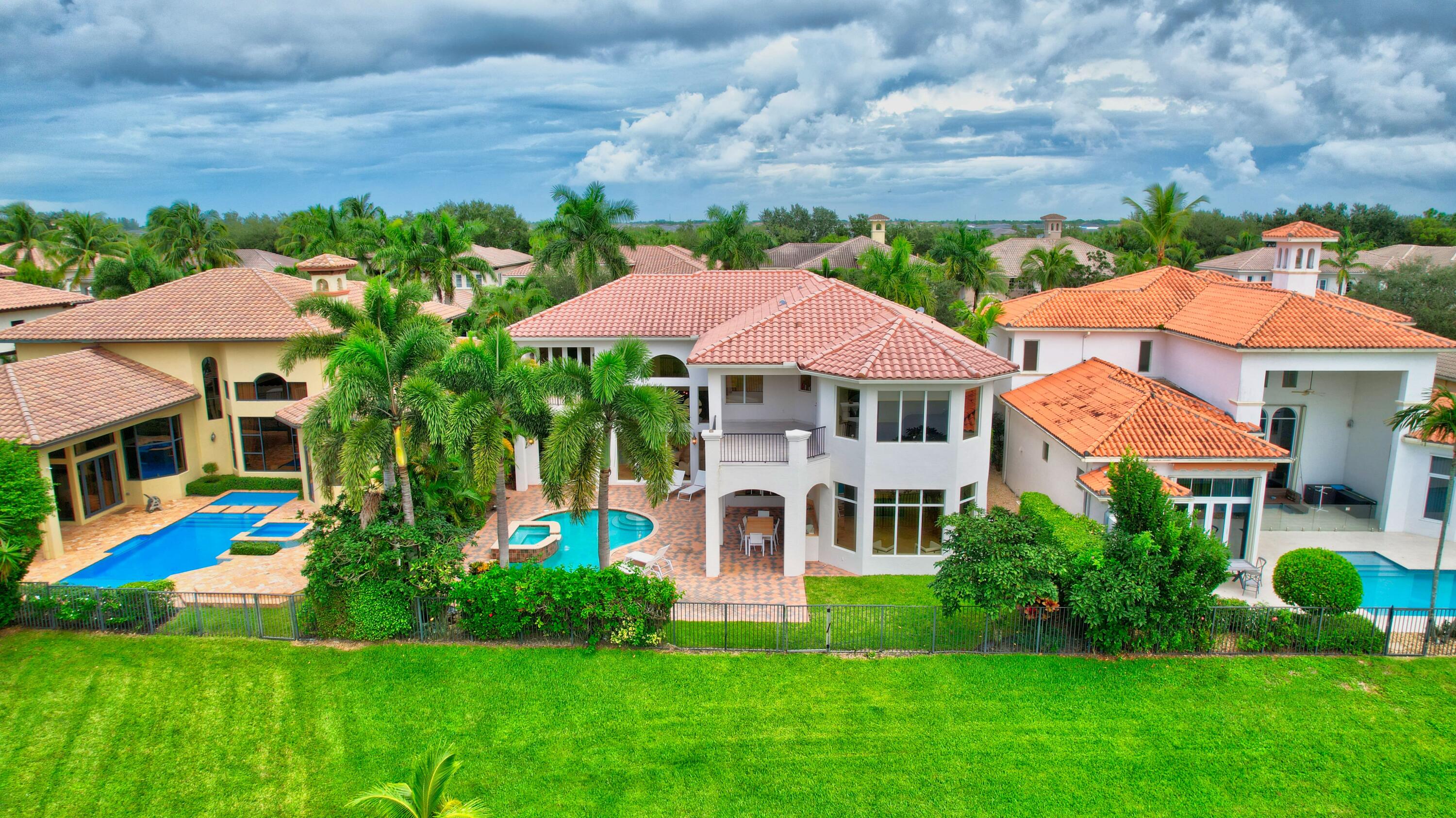 17698 Middlebrook Way Boca Raton, FL 33496 - Photo 51 of 68 a view of a house with a big yard and potted plants