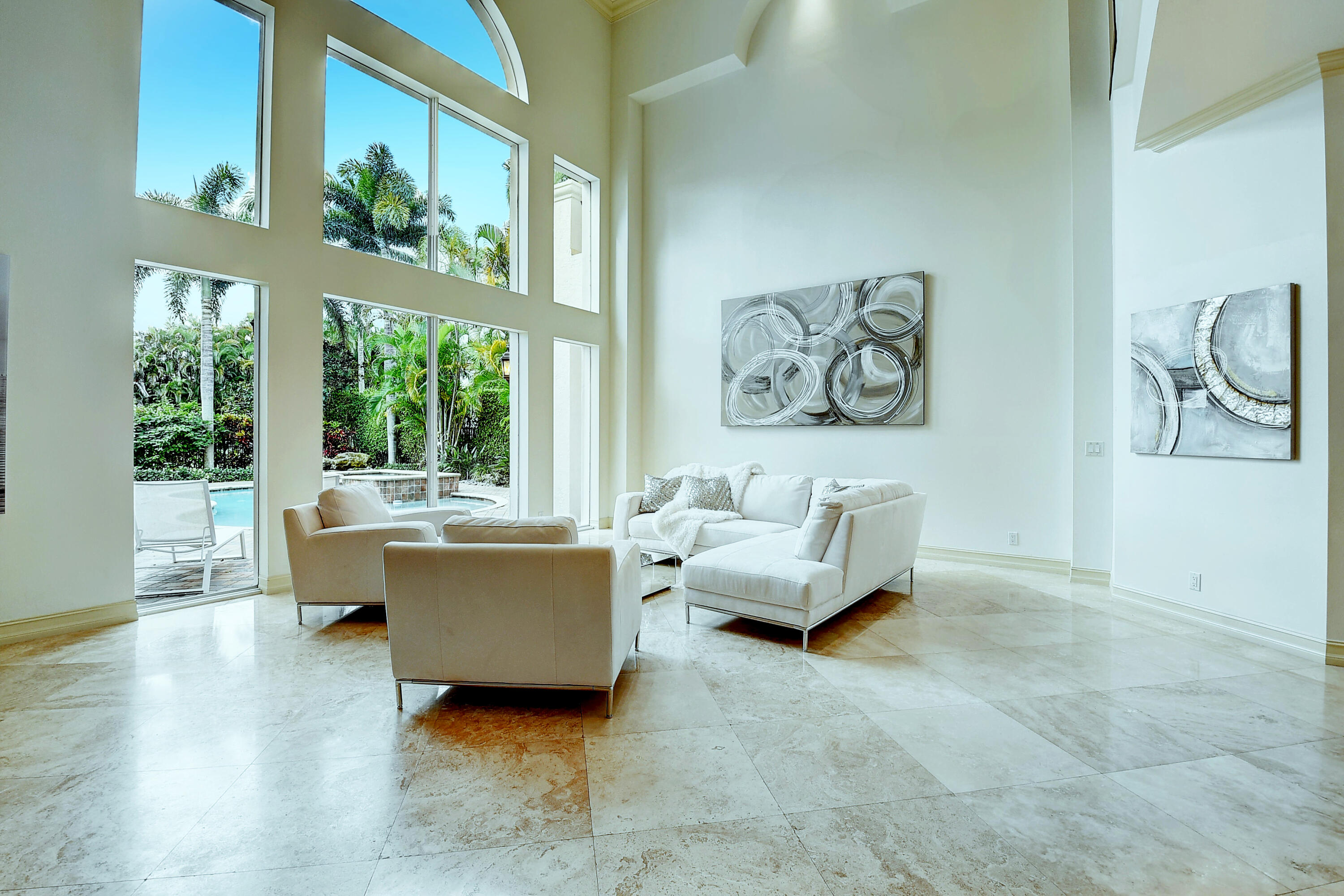 17698 Middlebrook Way Boca Raton, FL 33496 - Photo 9 of 68 a living room with furniture and a large window