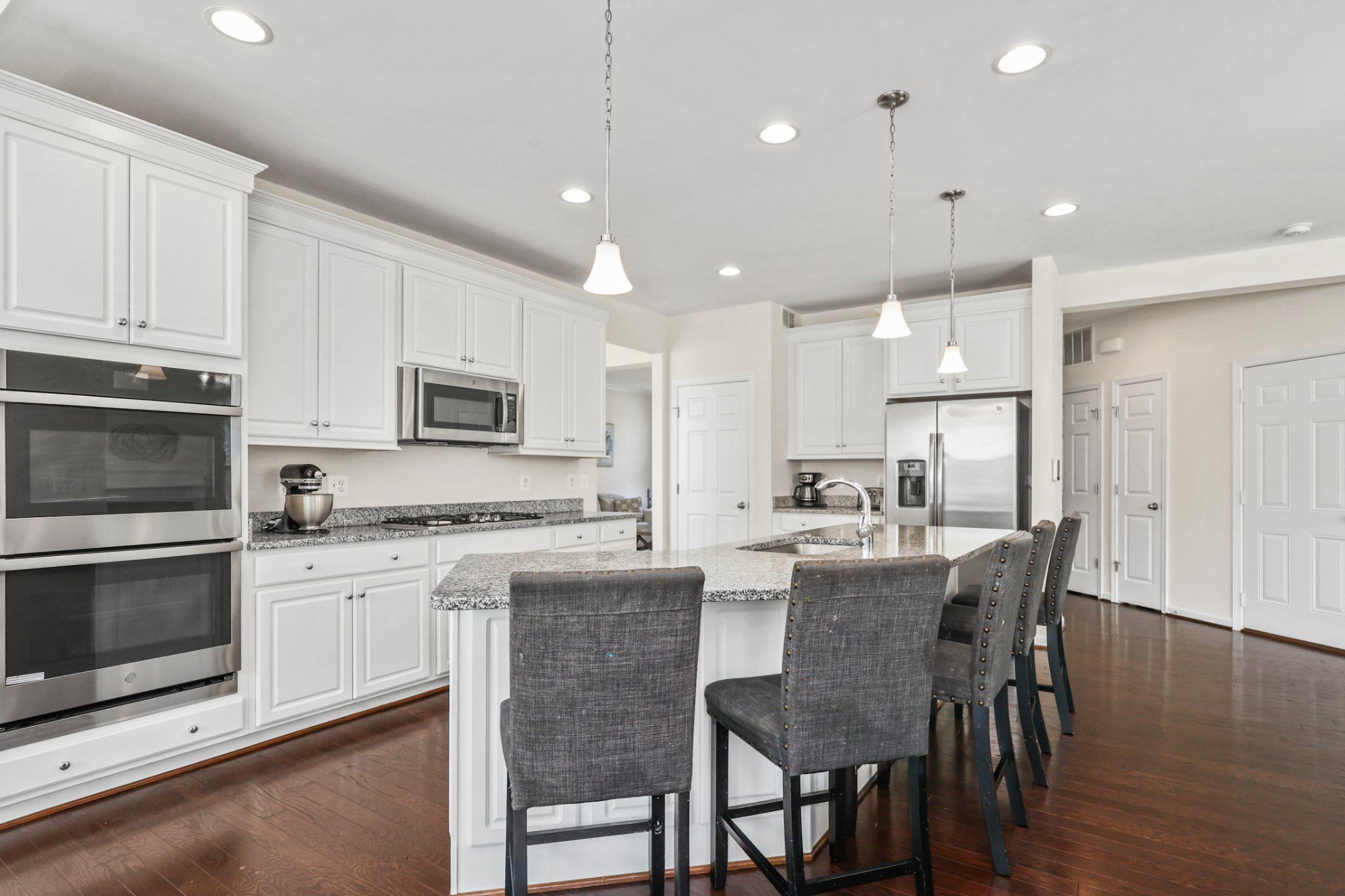 16183 Raptor Crest Lane Woodbridge, VA 22193 - Photo 11 of 51 Modern kitchen all stainless-steel appliances.