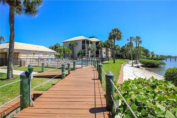 a view of a swimming pool with a patio