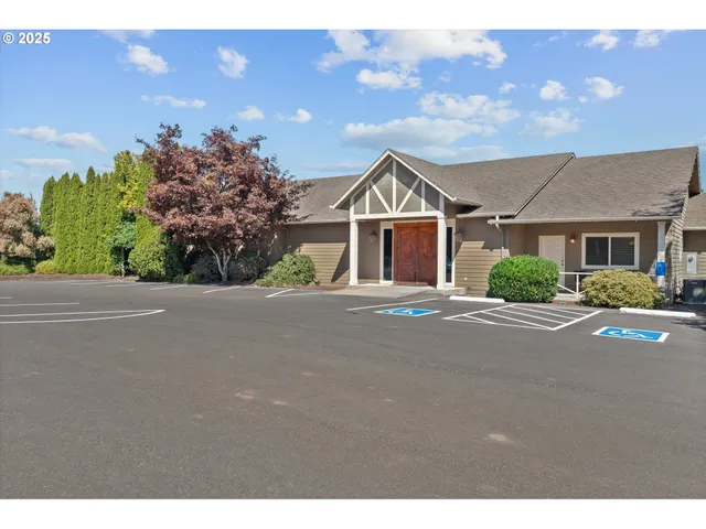 a view of house with a big yard