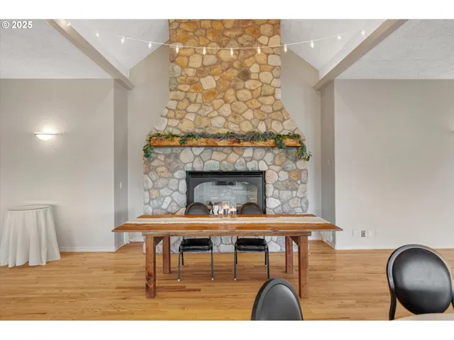 a kitchen with a stove top oven and cabinets