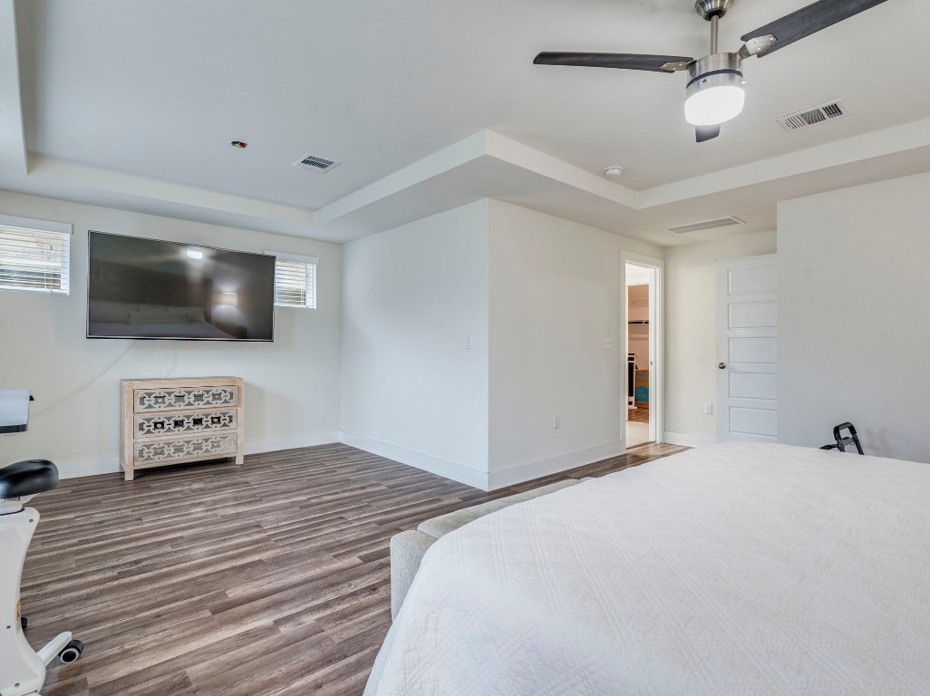 7408 Merrick Lane, Unit 42 Austin, TX 78745 - Photo 14 of 28 Bedroom and ensuite bath with plenty of natural light or curtains