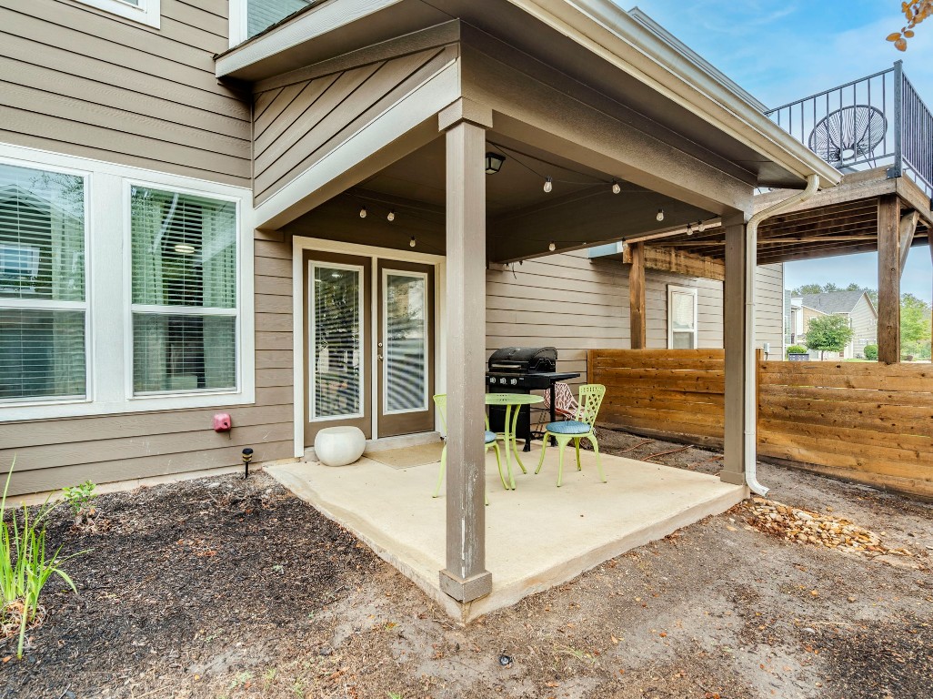 7408 Merrick Lane, Unit 42 Austin, TX 78745 - Photo 25 of 28 View of patio with a grill