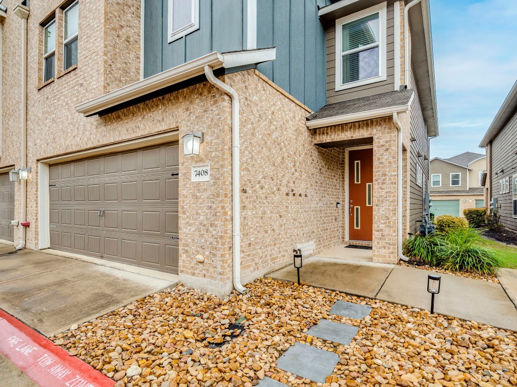 7408 Merrick Lane, Unit 42 Austin, TX 78745 - Photo 3 of 28 HOA maintained common space and visitor parking for convenience