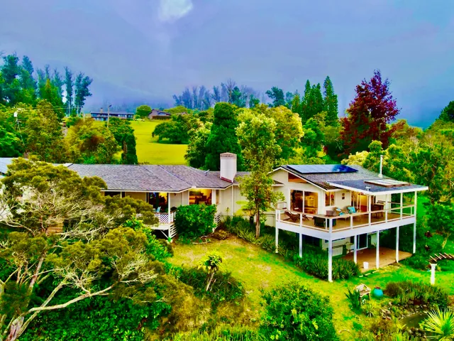a view of yard with swimming pool and outdoor seating