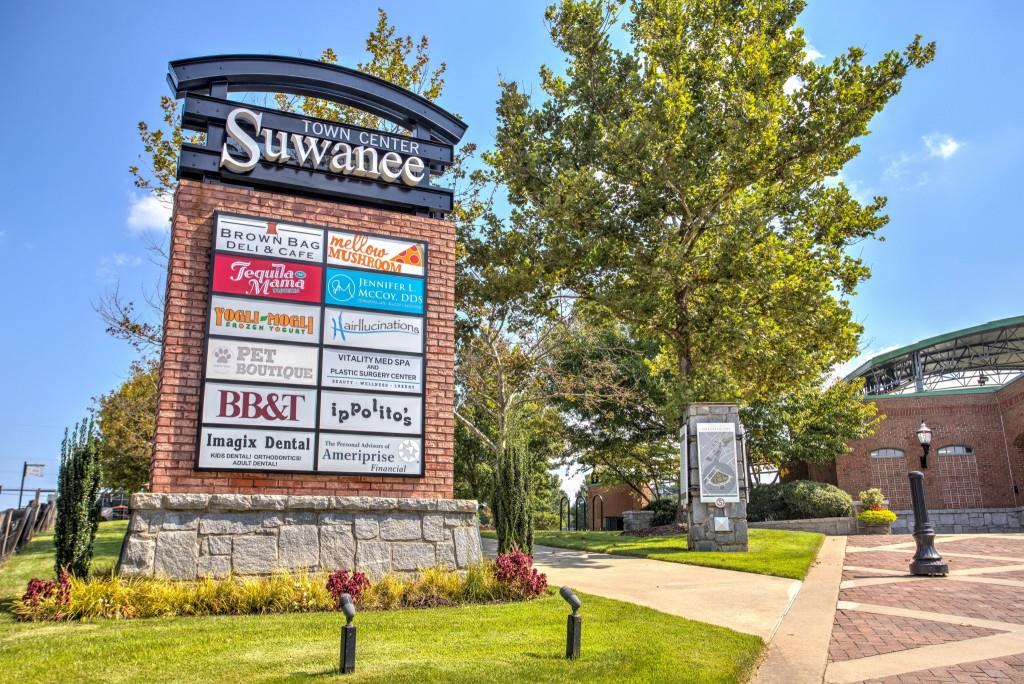 2773 Apperson Way Suwanee, GA 30024 - Photo 22 of 24 a view of a street with sign board