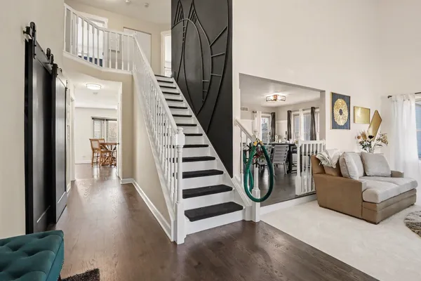 a view of living room and kitchen with furniture