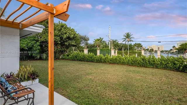 a view of a patio with chair and table