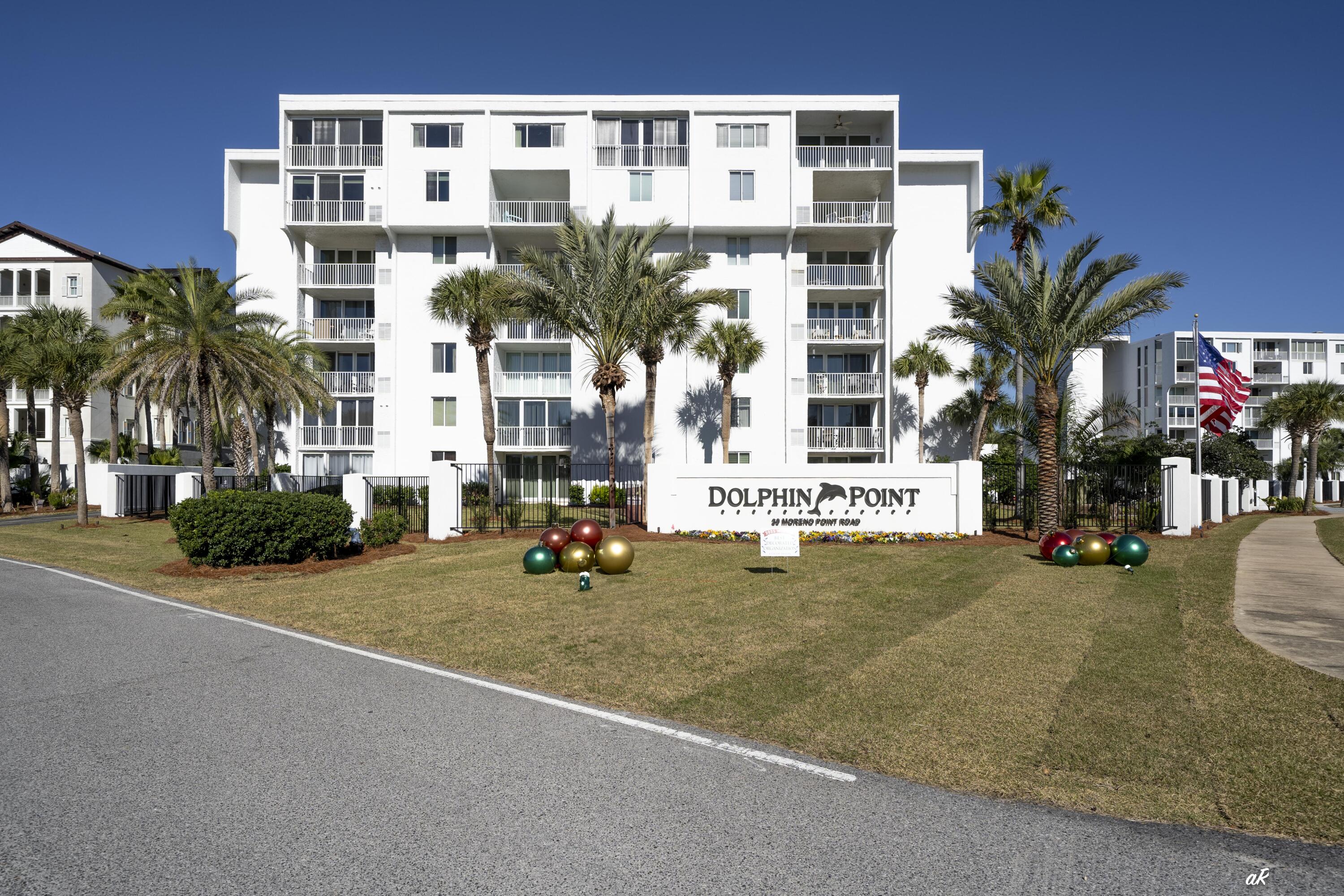 30 Moreno Point Road, Unit 404A Destin, FL 32541 - Photo 50 of 52 front view of a building with a street