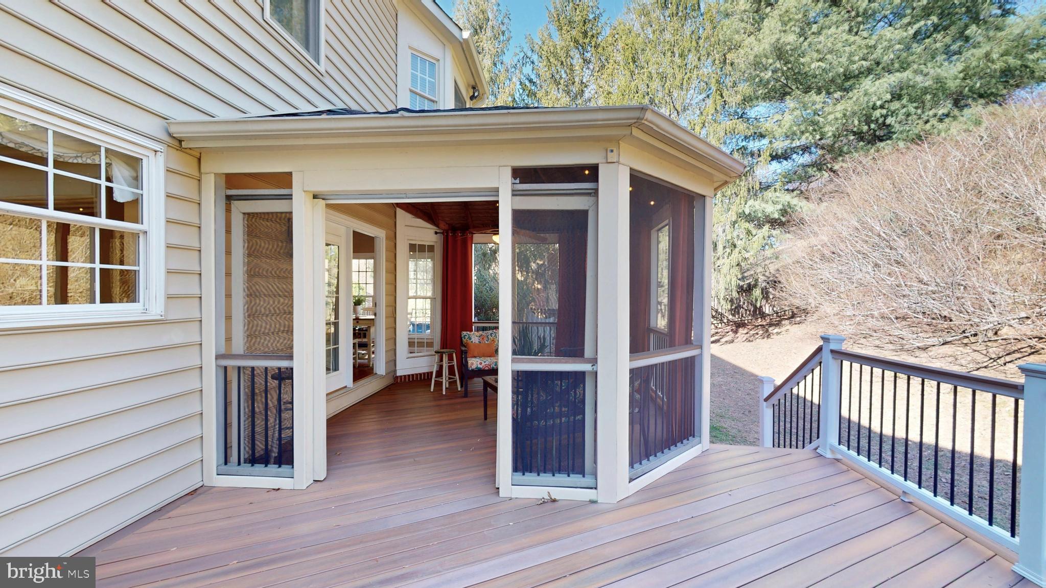 9728 Middleton Ridge Road Vienna, VA 22182 - Photo 25 of 81 a view of a house with wooden deck