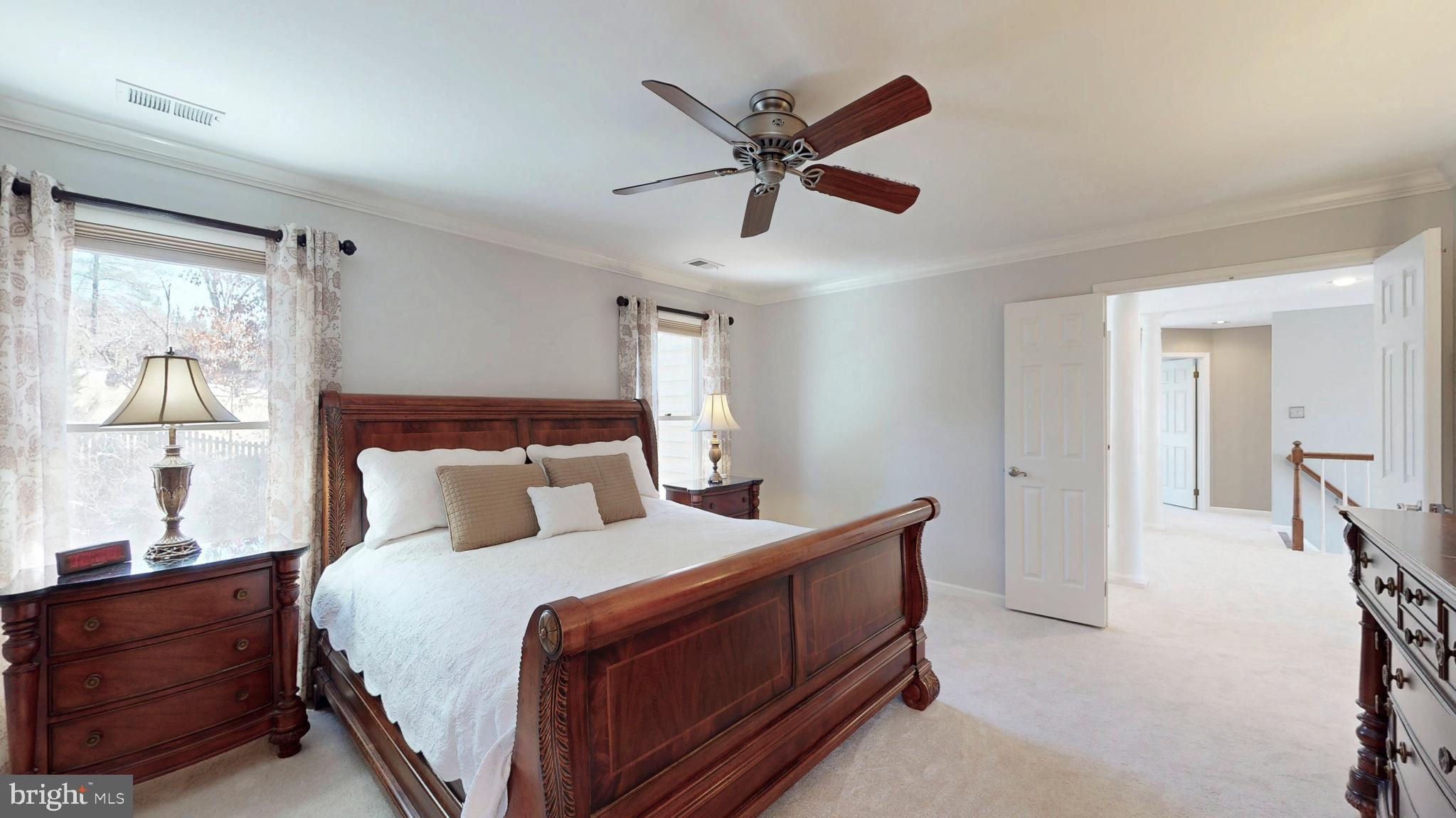 9728 Middleton Ridge Road Vienna, VA 22182 - Photo 36 of 81 a bedroom with a bed and window