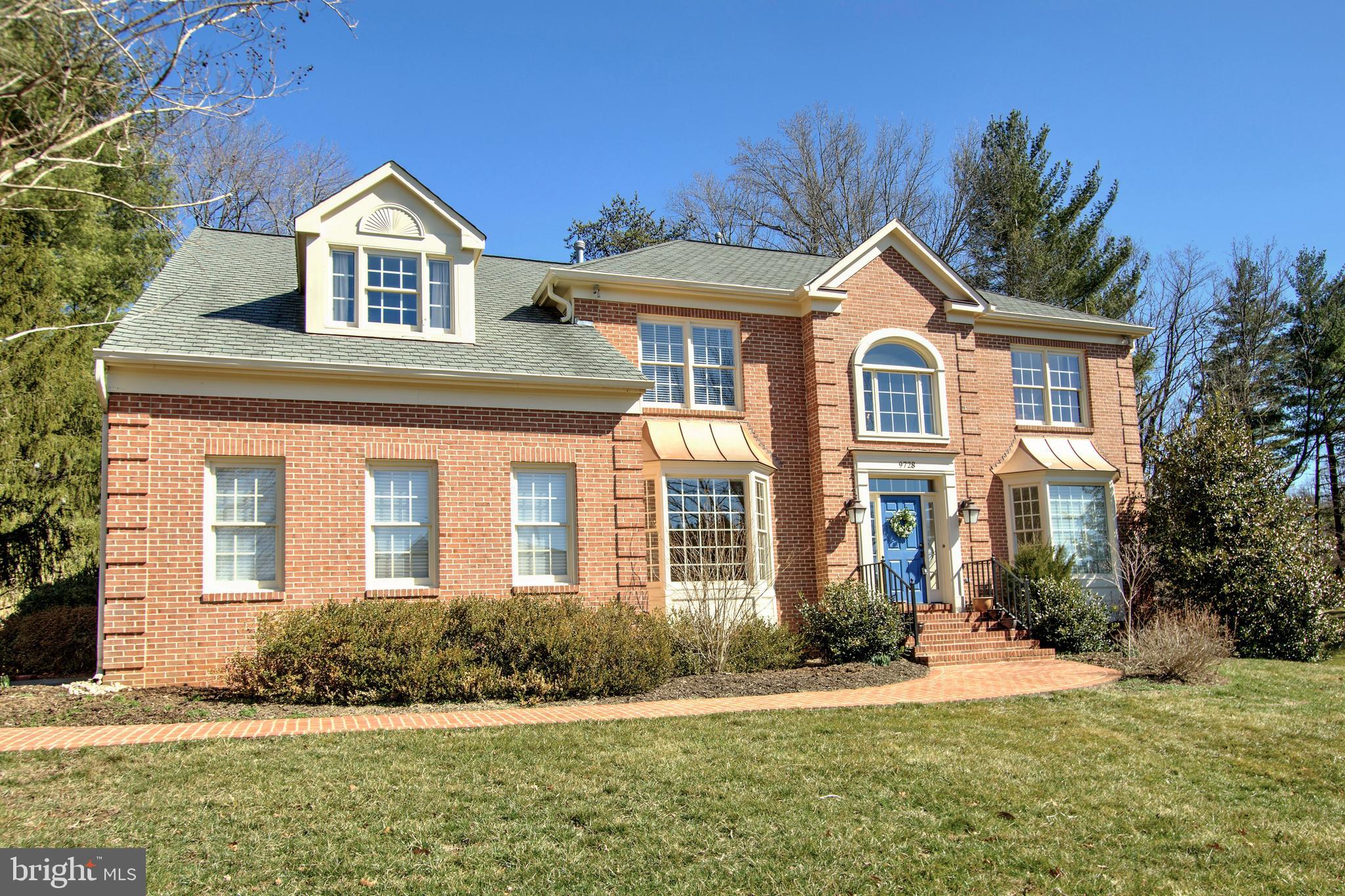 9728 Middleton Ridge Road Vienna, VA 22182 - Photo 69 of 81 a front view of a house with a yard