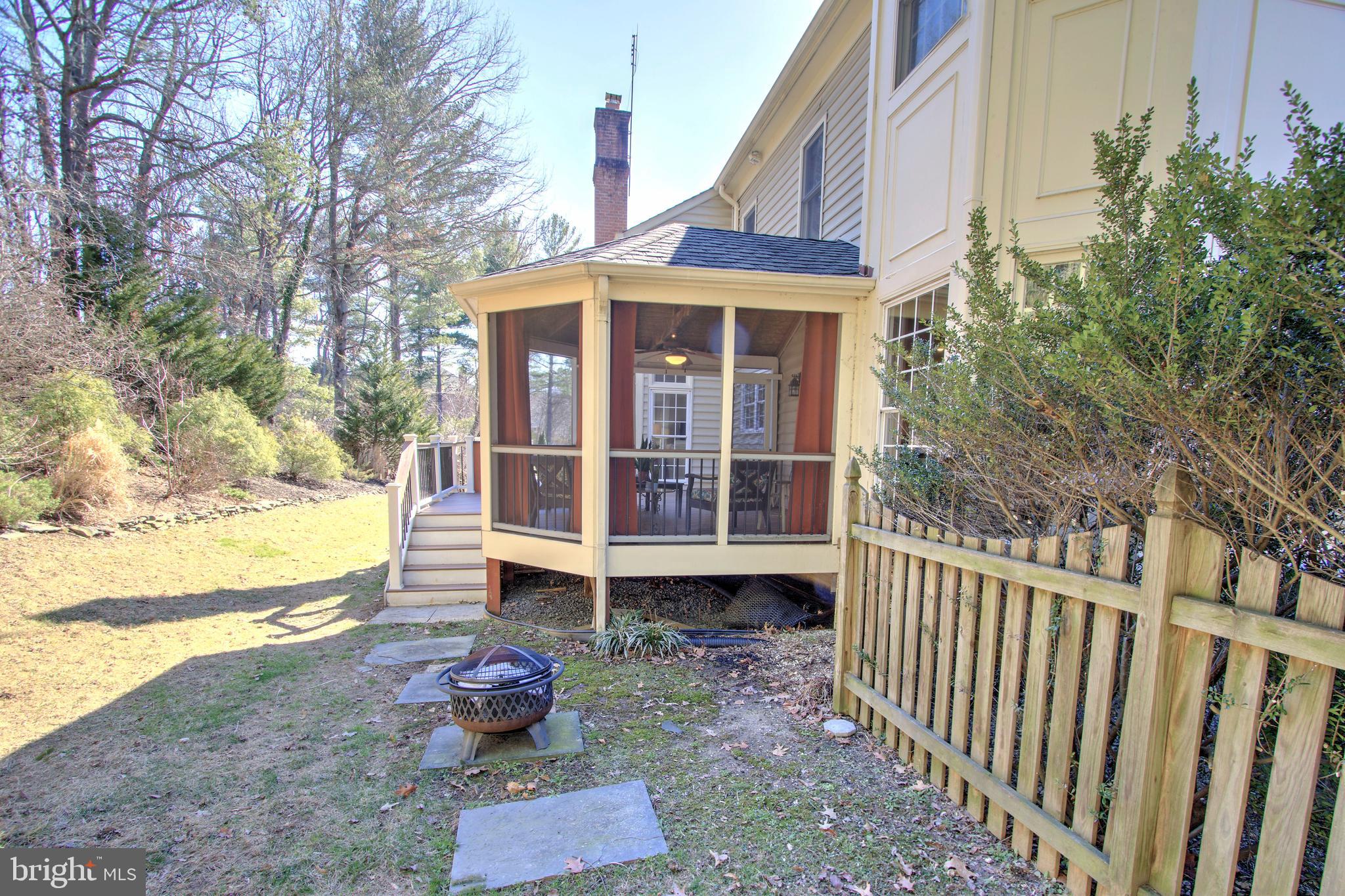 9728 Middleton Ridge Road Vienna, VA 22182 - Photo 73 of 81 a front view of a house with a yard