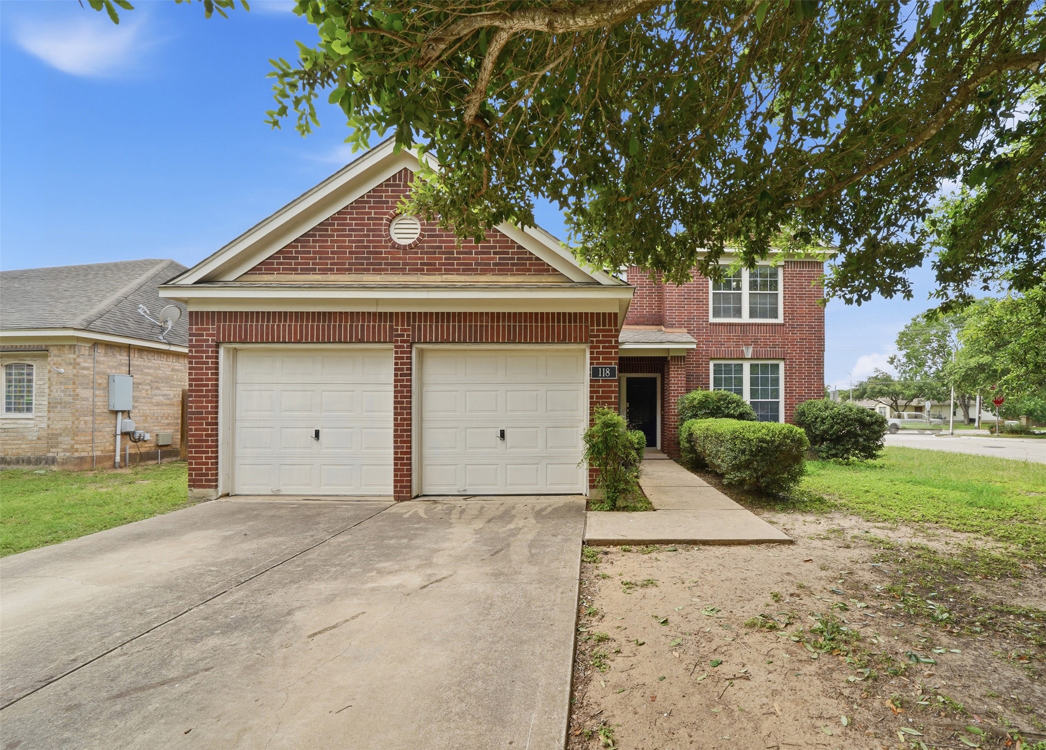 118 Invierno Street Kyle, TX 78640 - Photo 1 of 37 A well-maintained brick exterior with an attached two-car garage welcomes you home.