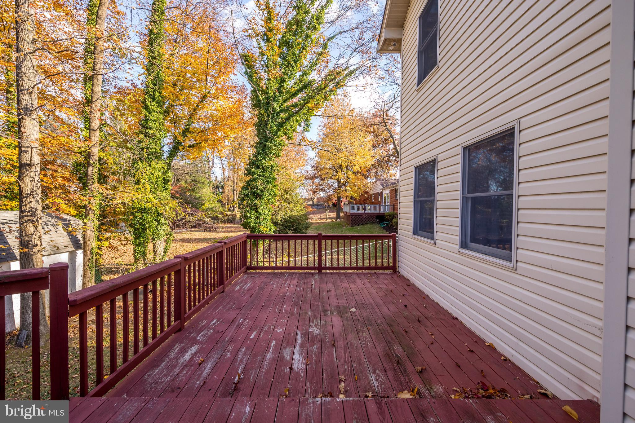 20 Glade Avenue Baltimore, MD 21236 - Photo 15 of 42 a view of balcony with wooden floor and fence