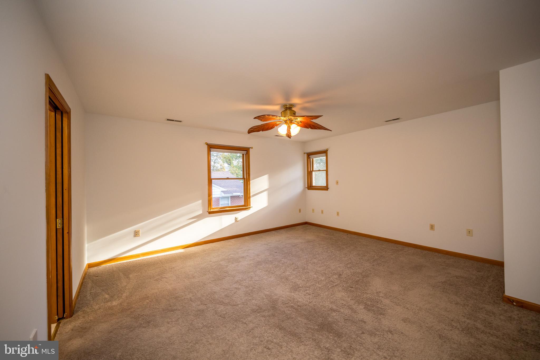 20 Glade Avenue Baltimore, MD 21236 - Photo 25 of 42 wooden floor in an empty room with a window