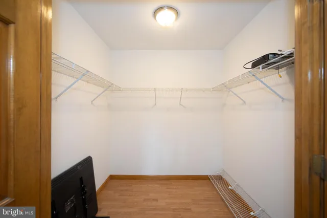 a view of a room with racks on the wall