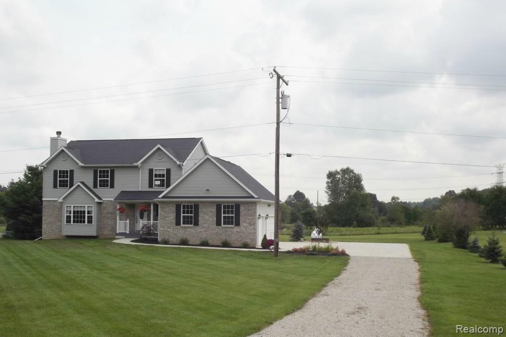 1937 Dutcher Road Howell, MI 48843 - Photo 1 of 18 1937 Dutcher front.jpg