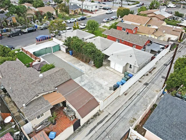 an aerial view of a house with a garden
