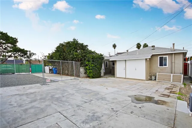 a view of a house with a outdoor space and backyard