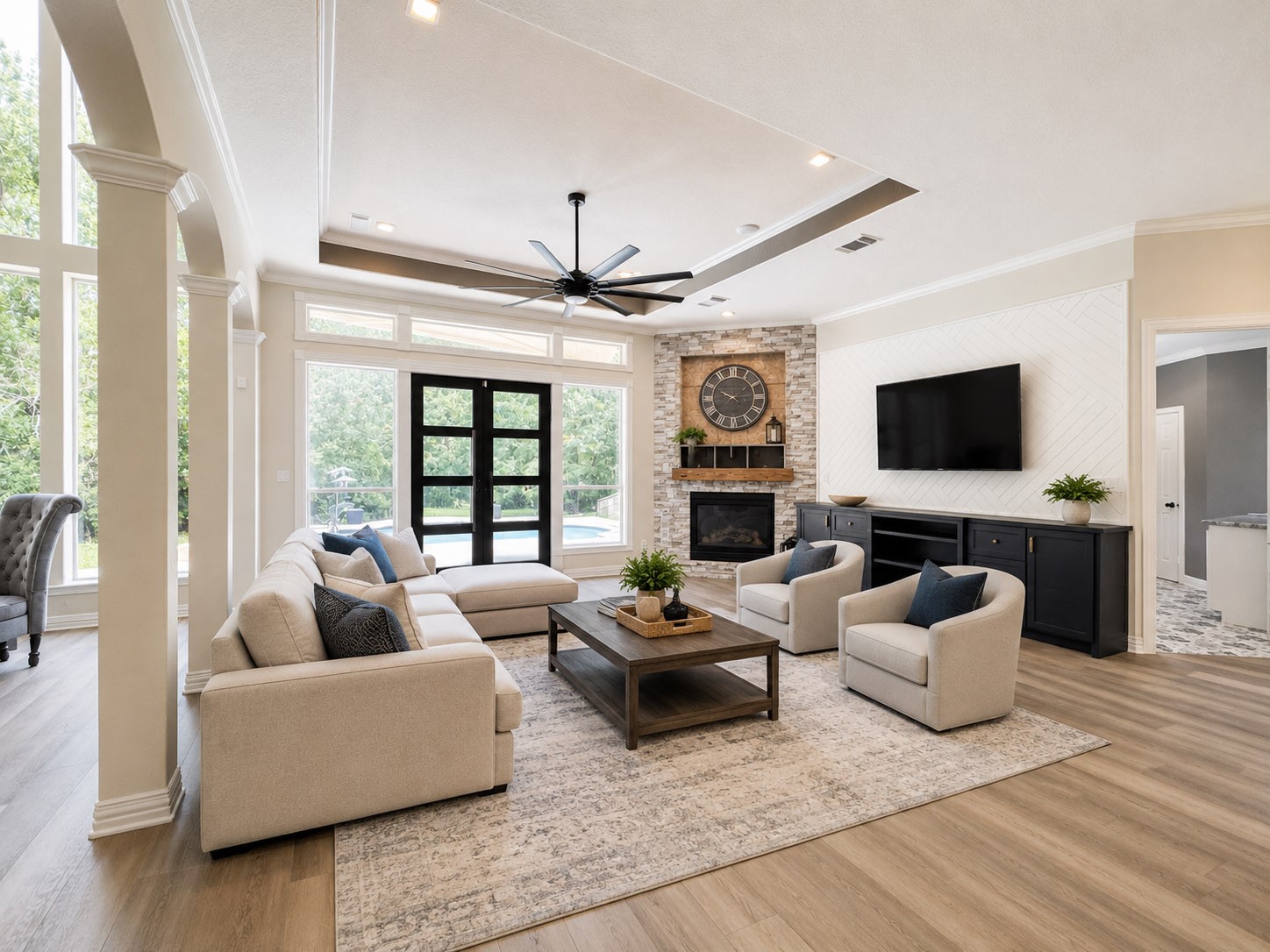1810 Woerner Road Houston, TX 77090 - Photo 15 of 39 Bright and inviting living area with modern staging, offering abundant natural light and a cozy, stylish ambiance.
