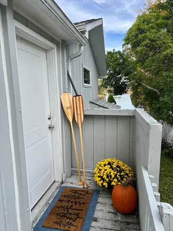 a wooden door in front of a house
