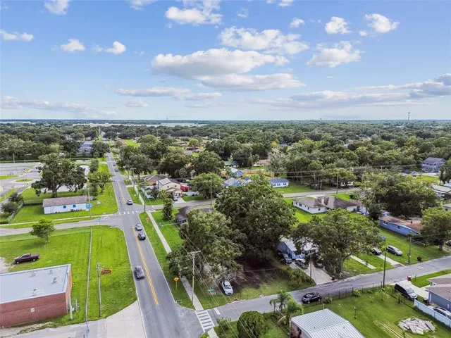 an aerial view of a house with a garden