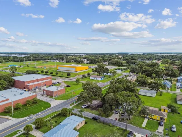 a view of a garden with a building