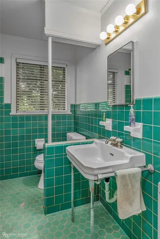 a view of a chair and table in the house
