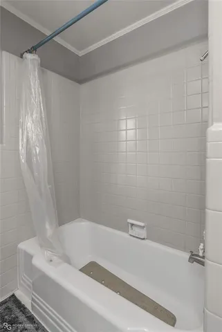 a bathroom with a white bath tub