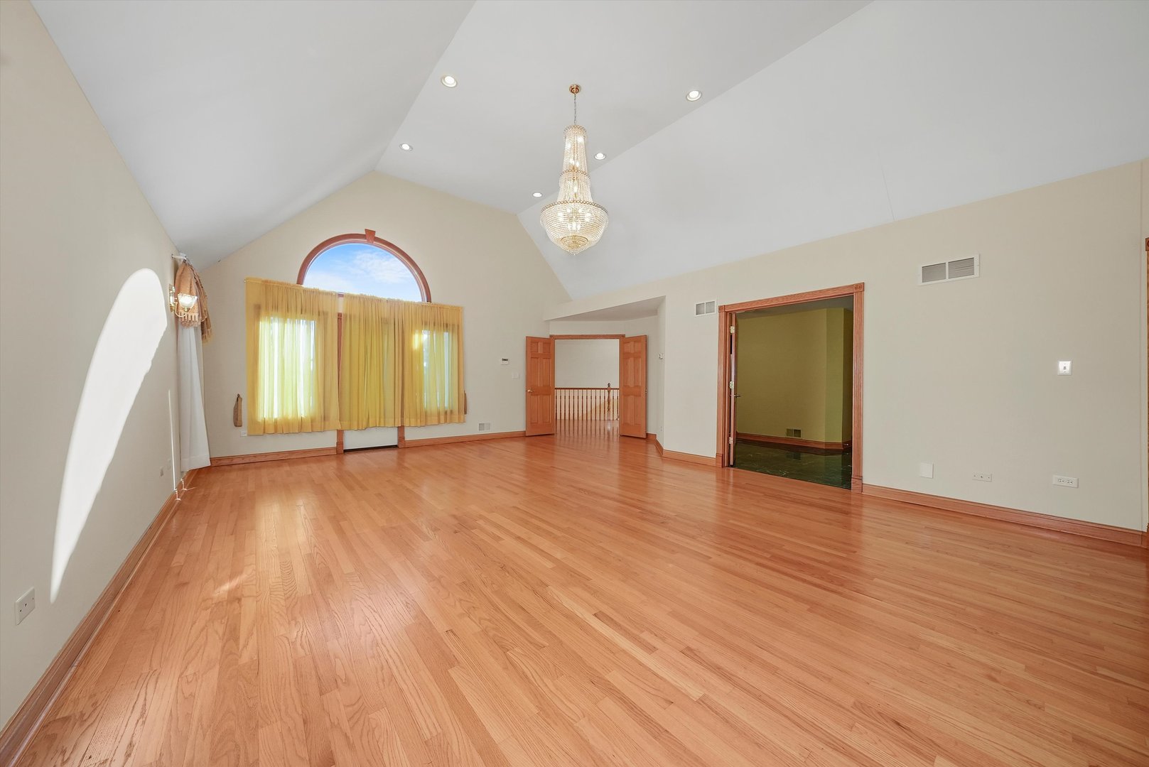 13220 Fox Lane Lemont, IL 60439 - Photo 17 of 43 wooden floor in an empty room with a window