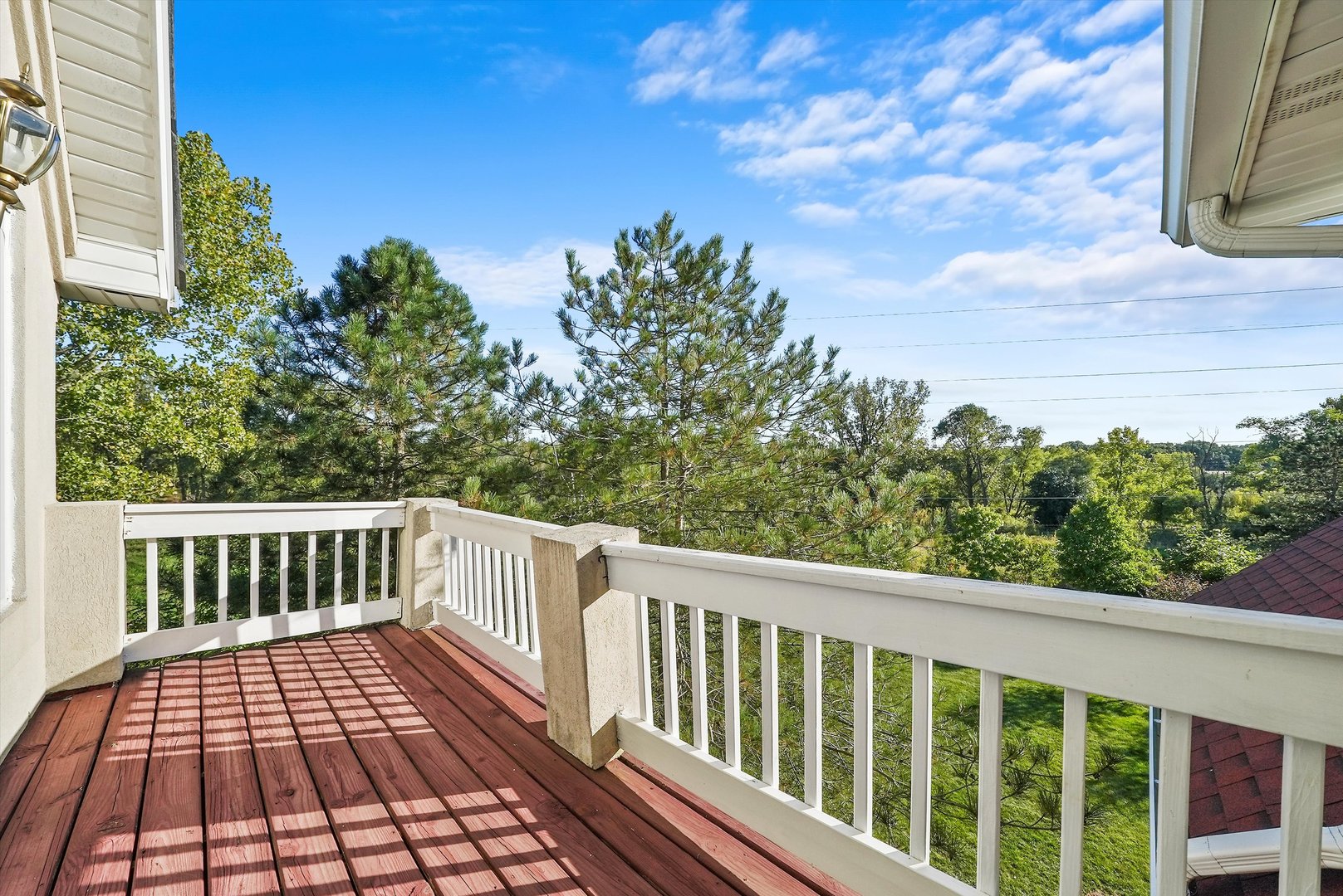 13220 Fox Lane Lemont, IL 60439 - Photo 18 of 43 a view of a balcony with wooden floor