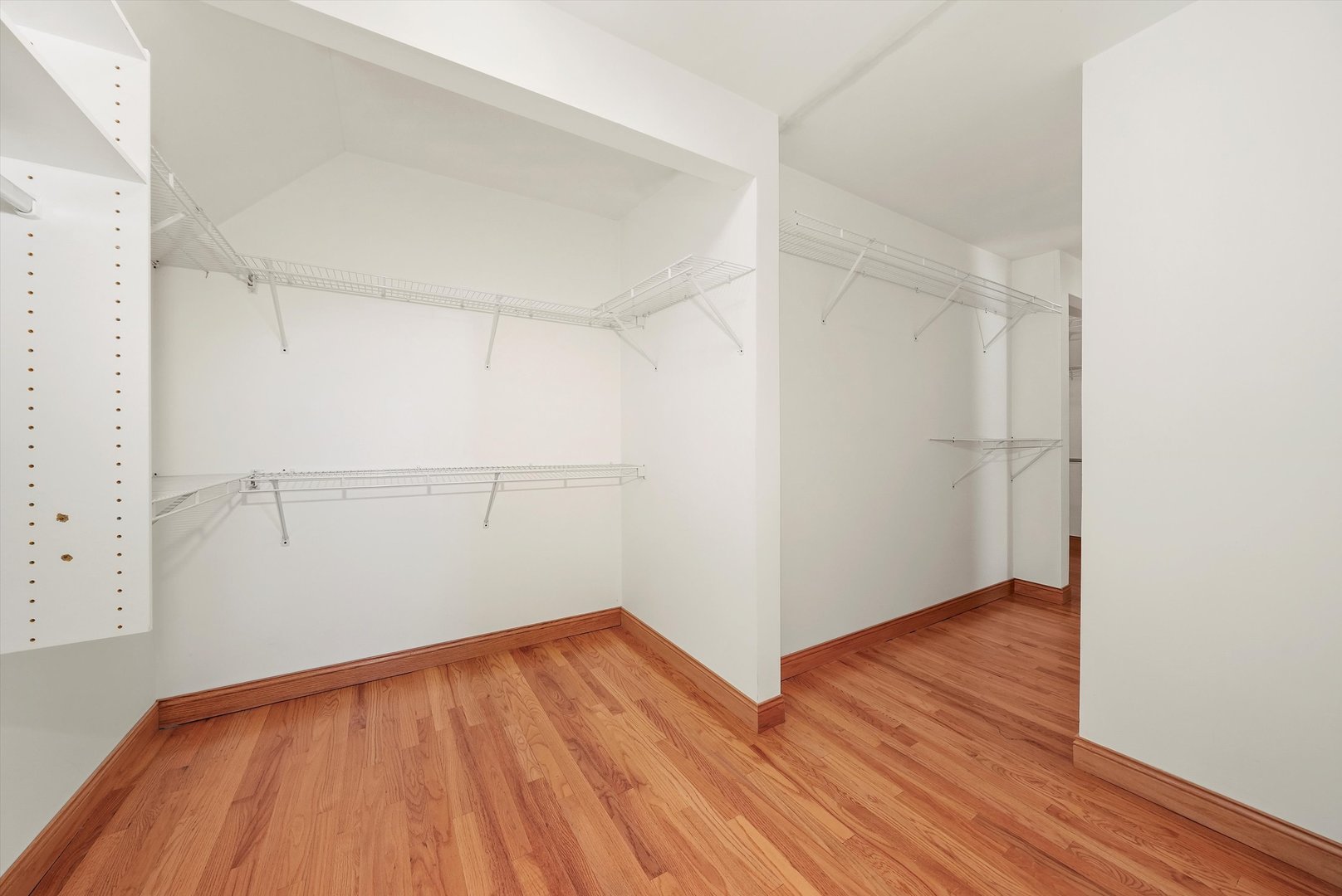 13220 Fox Lane Lemont, IL 60439 - Photo 19 of 43 an empty room with wooden floor